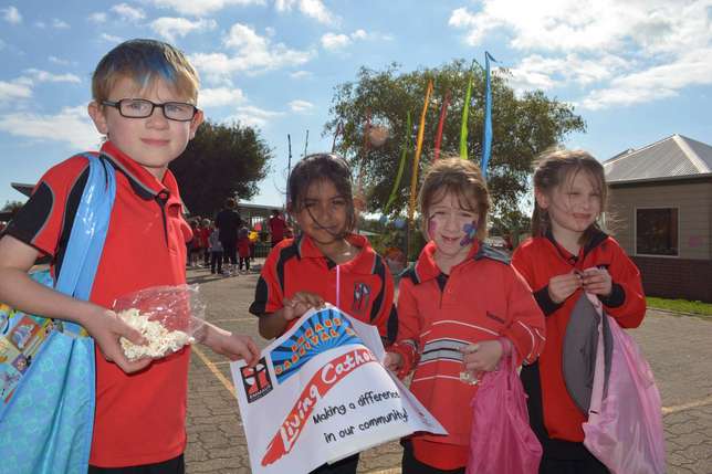 Carnival day holding sign.JPG